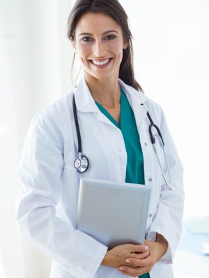 beautiful-young-female-doctor-looking-camera-office